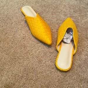 Yellow slides, never been worn.